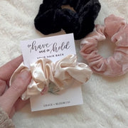 Looking for the perfect thing to add to your bridesmaid proposal boxes? These soft velvet or satin scrunchies and pretty beaded hair accessories make the perfect gifts for your girls!  They are wrapped around cards with lovely watercolor designs and hand-lettering done by our resident artist, Sierra. You can choose from 3 card styles and several scrunchie colors. Or let us choose for you!