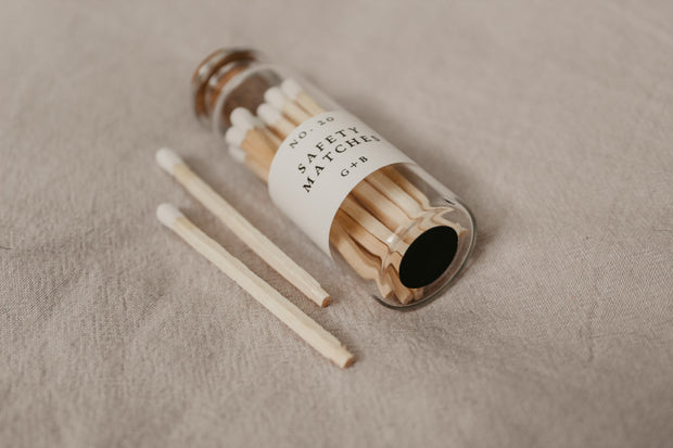 A decorative bottle of matches can be such a cute addition to your decor while keeping them handy for lighting your candles. Grace + Bloom Candle Co white-tipped safety matches are in a cork-topped apothecary vial with a striker pad on the bottom of the bottle.